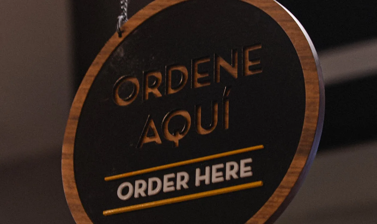Consistent brand voice shown in Spanish and English for international brand